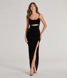 Turn heads at Prom 2025 in this black prom dress, where statement-making details meet the iconic style of the Myah Sleeveless High-Slit Velvet Cutout Dress .