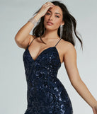 Step into the Prom 2025 dance in the Julianne V-Neck Mermaid Tulle Sequin Formal Dress in navy, a stunning blue prom dress designed to complement any theme with its timeless allure and statement-making style.