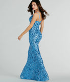 The Kara V-Neck Mermaid Sequin Formal Dress is a dazzling periwinkle sequin dress, perfect for making a bold entrance at any event, from cocktail parties to formal celebrations.