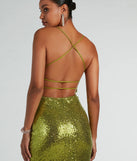 Shine bright in the Jennifer Strappy Back High Slit Sequin Formal Dress, a glamorous chartreuse sequin dress that captures the light beautifully, ideal for an NYE party dress, wedding guest dress, or military ball gown.