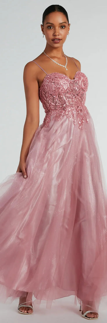 The Aila Sweetheart Beaded A-Line Glitter Formal Dress is a shimmery rose glitter dress that catches the light beautifully, perfect for any special outfit like Winter Formal attire, clubwear, or a wedding guest dress.