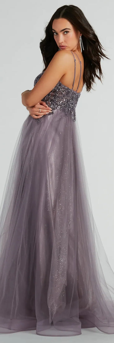 Stand out in a crowd with the Vanessa A-Line Glitter Tulle Formal Dress, a glamorous lavender sequin dress that sparkles effortlessly as an NYE party gown, wedding guest dress, or must-have evening wear for formal events like military balls and winter formals.