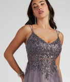 The Vanessa A-Line Glitter Tulle Formal Dress is a dazzling lavender sequin dress, perfect for making a bold entrance at any event, from cocktail parties to formal celebrations.