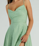 Step into summer looking effortlessly chic in the Silvia Lace-Up Floral Satin A-Line Formal Dress in sage green, a must-have Windsor dress for your warm-weather wardrobe.