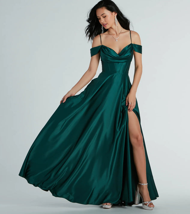 The Alira Cold Shoulder A-Line Satin Formal Dress in hunter is a stunning green prom dress designed to capture attention with its fresh or bold color and effortlessly stylish silhouette.