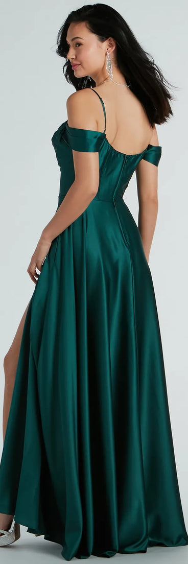 The Alira Cold Shoulder A-Line Satin Formal Dress in hunter is a stunning green prom dress designed to capture attention with its fresh or bold color and effortlessly stylish silhouette.