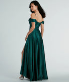 The Alira Cold Shoulder A-Line Satin Formal Dress in hunter is a stunning green prom dress designed to capture attention with its fresh or bold color and effortlessly stylish silhouette.