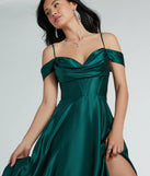 The Alira Cold Shoulder A-Line Satin Formal Dress in hunter is a stunning green prom dress designed to capture attention with its fresh or bold color and effortlessly stylish silhouette.
