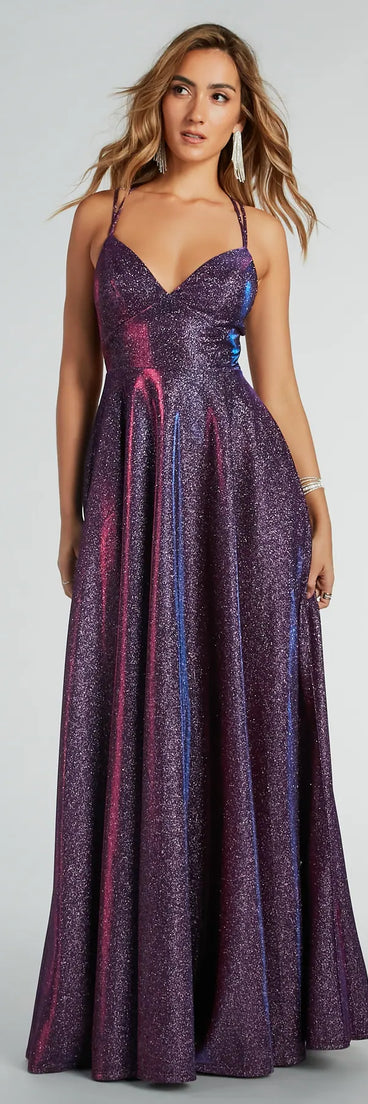 The Sherry Caged Strappy A-Line Glitter Formal Dress is a shimmery purple glitter dress that catches the light beautifully, perfect for any special outfit like Winter Formal attire, clubwear, or a wedding guest dress.
