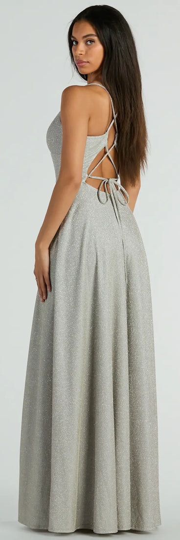 The Mary Lace Up A-Line Glitter Formal Dress With Pockets is an elegant silver formal dress in a rich seasonal color and with unique design accents that make dressing up for winter parties, holiday balls, or festive gatherings effortless!