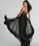 The Fatima V-Neck Embroidered A-Line Tulle Dress is a show-stopping black prom dress, offering a sleek, slimming silhouette that enhances your natural beauty for an unforgettable night.