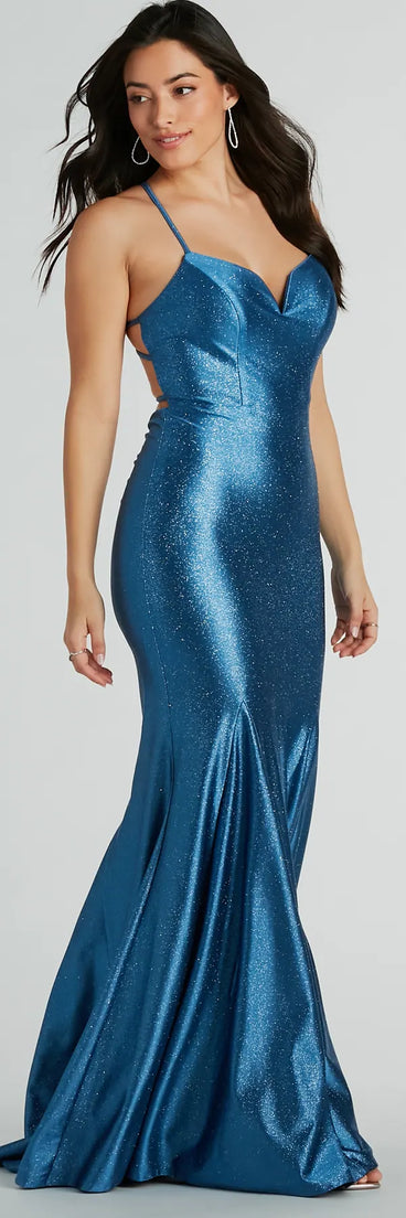 The Mindy Strappy Back Mermaid Satin Glitter Dress is a shimmery denim glitter dress that catches the light beautifully, perfect for any special outfit like Winter Formal attire, clubwear, or a wedding guest dress.