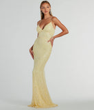 Turn heads at Prom 2025 in this yellow prom dress, where statement-making details meet the iconic style of the Bethanie Formal Sequin V-Neck Mermaid Dress .