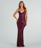 Turn heads at Prom 2025 in this plum prom dress, where statement-making details meet the iconic style of the Taisia Formal Sequin Scroll Dress .