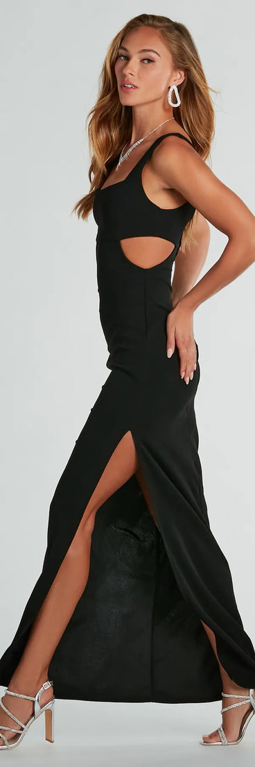 Turn heads at HOCO 2025 in this black homecoming dress, where statement-making details meet the iconic style of the Quinn Cutout High Slit Crepe Formal Dress.