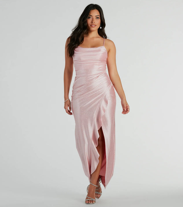 Turn heads at Prom 2025 in this pink prom dress, where statement-making details meet the iconic style of the Ellen Ruffled Slit Long Glitter Formal Dress .