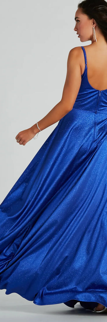 The Amina Scoop Neck A-Line Glitter Formal Dress is an elegant royal blue formal dress in a rich seasonal color and with unique design accents that make dressing up for winter parties, holiday balls, or festive gatherings effortless!