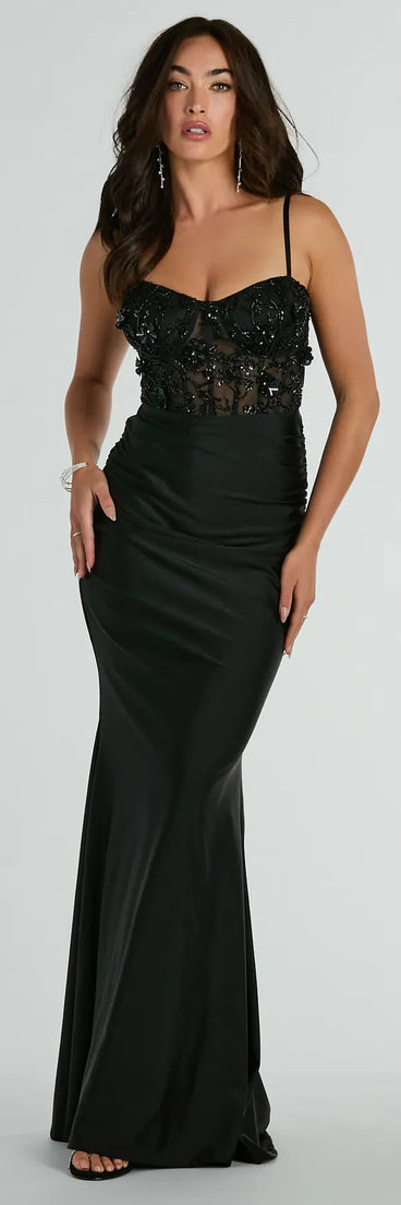 Turn heads at Prom 2025 in this black prom dress, where statement-making details meet the iconic style of the Gina Beaded Floral Bustier Lace Up Mermaid Formal Dress .