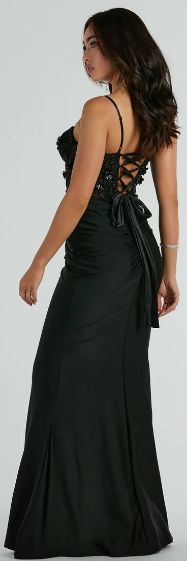 The Gina Beaded Floral Bustier Lace Up Mermaid Formal Dress is a stylish black floral dress featuring a fresh seasonal print and flattering design, perfect for garden parties, bridal showers, graduation photoshoots, or everyday spring styling.