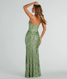 The Jillian Sequin Slit Long Formal Dress in sage is a stunning green prom dress designed to capture attention with its fresh or bold color and effortlessly stylish silhouette.