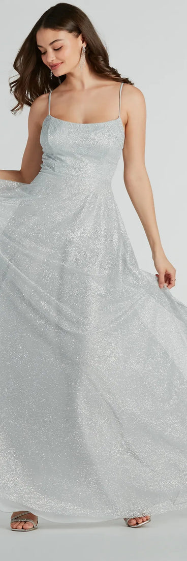 The Kira Lace-Up Glitter Tulle A-Line Formal Dress is a shimmery silver glitter dress that catches the light beautifully, perfect for any special outfit like Winter Formal attire, clubwear, or a wedding guest dress.