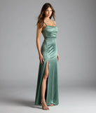 Step into summer looking effortlessly chic in the Marissa Formal Satin Cowl Neck Dress in sage green, a must-have Windsor dress for your warm-weather wardrobe.