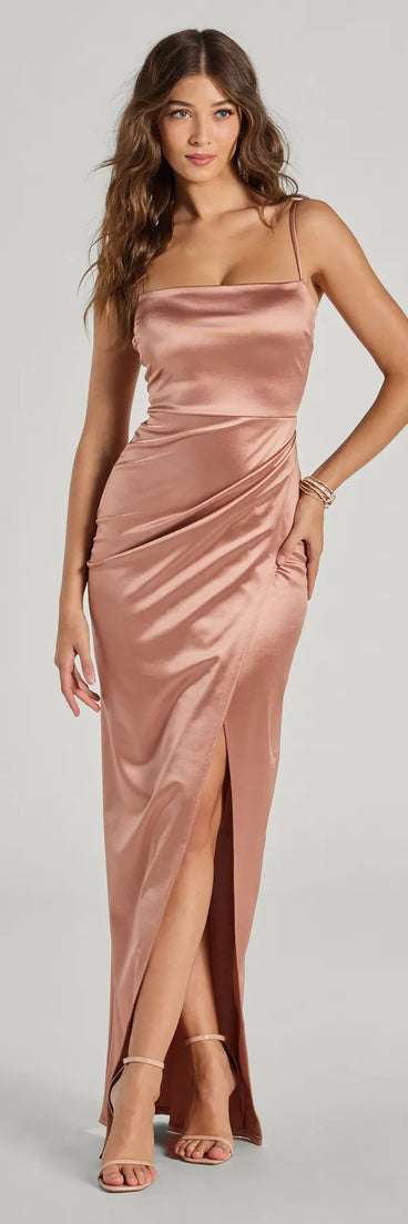 Turn heads at HOCO 2025 in this rose gold homecoming dress, where statement-making details meet the iconic style of the Mayra Formal Satin Slit Long Dress.