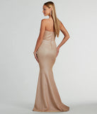 The Kimora Strapless High Low Mermaid Formal Dress is an elegant gold formal dress in a rich seasonal color and with unique design accents that make dressing up for winter parties, holiday balls, or festive gatherings effortless!