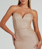 Dazzle at your next event with the glitzy Kimora Strapless High Low Mermaid Formal Dress, a stunning gold glitter dress featuring sparkling details ideal for holiday parties or formal gatherings from galas to Winter Formal dances.