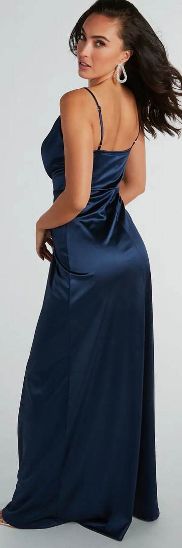 The Ellie Cowl Neck A-Line Long Satin Formal Dress is an elegant navy blue formal dress in a rich seasonal color and with unique design accents that make dressing up for winter parties, holiday balls, or festive gatherings effortless!
