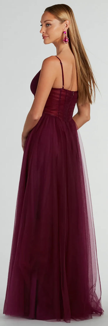 The Paulette Sleeveless A-Line Mesh Formal Dress is an elegant plum formal dress in a rich seasonal color and with unique design accents that make dressing up for winter parties, holiday balls, or festive gatherings effortless!