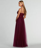 The Paulette Sleeveless A-Line Mesh Formal Dress is an elegant plum formal dress in a rich seasonal color and with unique design accents that make dressing up for winter parties, holiday balls, or festive gatherings effortless!