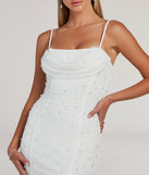 Make a bold statement in the Klara Cowl Neck Faux Pearl Bead Column Dress in white, the perfect spring dress for weddings, cocktail hours, nights out, and/or seasonal celebrations.