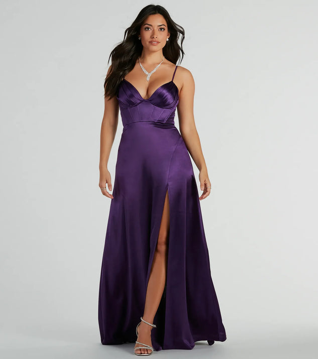 The Haley Corset Slit A-Line Satin Formal Dress is an elegant purple formal dress in a rich seasonal color and with unique design accents that make dressing up for winter parties, holiday balls, or festive gatherings effortless!