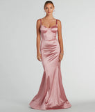 The Ria Bustier Mermaid Glitter Satin Formal Dress is a shimmery blush glitter dress that catches the light beautifully, perfect for any special outfit like Winter Formal attire, clubwear, or a wedding guest dress.
