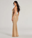 Celebrate the winter holidays in a nude long dress like the Gianna Rhinestone Pearl Sheer Mesh Formal Dress, designed with timeless charm for party-ready occasions from winter bridesmaid looks to Winter Formal dances.