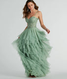Turn heads at Prom 2025 in this sage green prom dress, where statement-making details meet the iconic style of the Keyla Floral Applique Tiered Ruffle Tulle Gown .