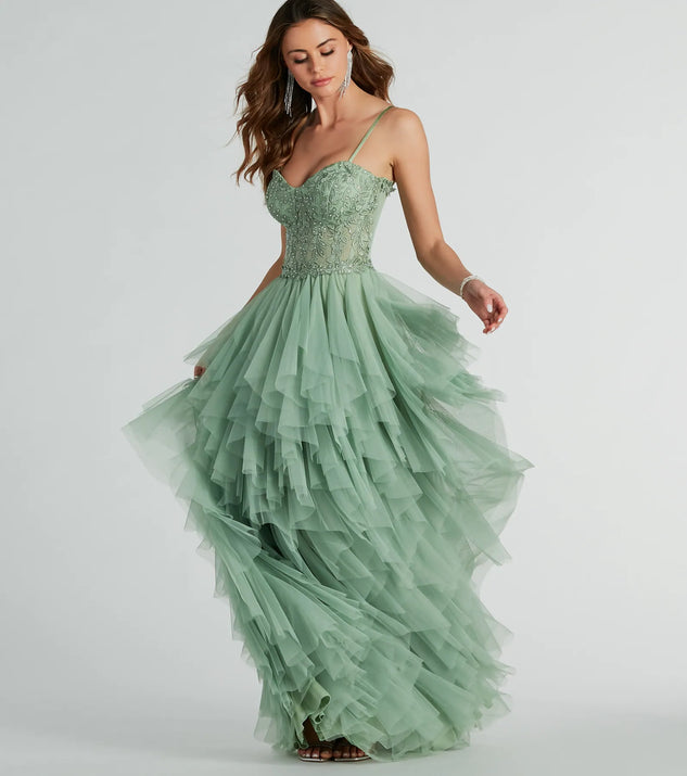 Turn heads at Prom 2025 in this sage green prom dress, where statement-making details meet the iconic style of the Keyla Floral Applique Tiered Ruffle Tulle Gown .