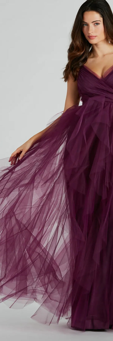 The Hadley V-Neck Ruffled A-Line Tulle Formal Dress is an elegant eggplant purple formal dress in a rich seasonal color and with unique design accents that make dressing up for winter parties, holiday balls, or festive gatherings effortless!