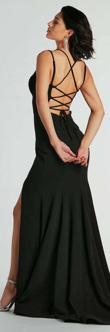 You'll be the best dressed in the Gabriela V-Neck Lace-Up Mermaid Crepe Formal Dress as your winter formal dress with beautiful and unique details from Windsor.