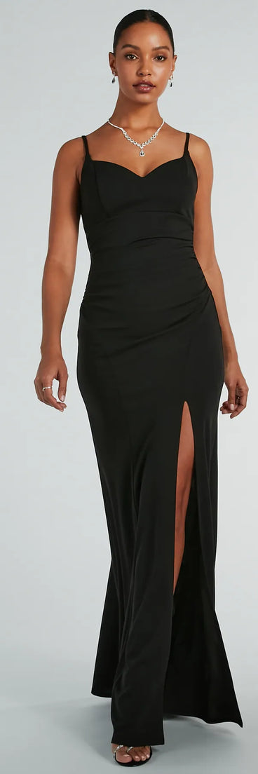 Turn heads at Prom 2025 in this black prom dress, where statement-making details meet the iconic style of the Hillary Sweetheart A-Line Crepe Formal Dress .