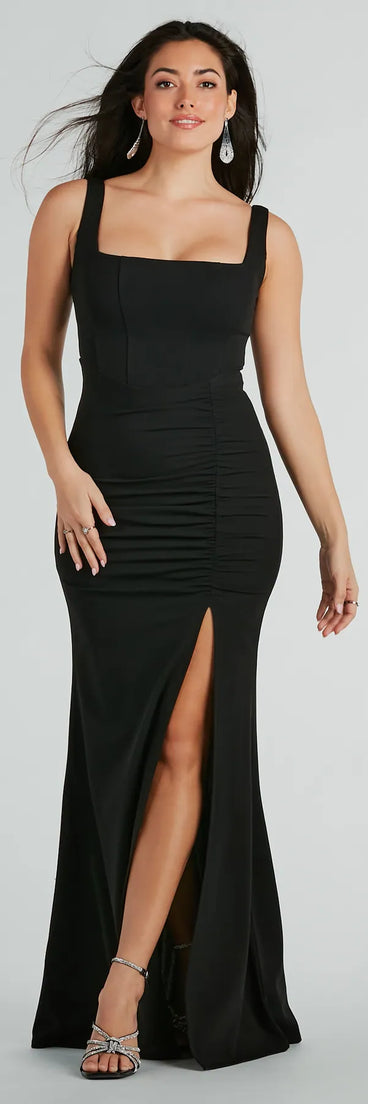Turn heads at Prom 2025 in this black prom dress, where statement-making details meet the iconic style of the Sara Sleeveless Mermaid Crepe Long Formal Dress .