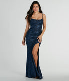 Turn heads at Prom 2025 in this navy blue prom dress, where statement-making details meet the iconic style of the Ashelyn Cowl Neck Glitter Mermaid Formal Dress .