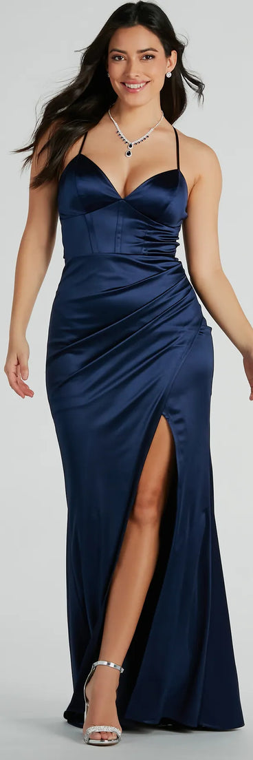 Turn heads at Prom 2025 in this navy blue prom dress, where statement-making details meet the iconic style of the Loraine Sweetheart Wrap Mermaid Satin Formal Dress .