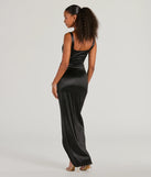 The elegant Rebecca Satin Slim-Fit Formal Dress is a black satin bridesmaid dress crafted with luxe fabric, ideal for modern weddings and traditional bridal parties.