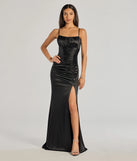 Turn heads at Prom 2025 in this black prom dress, where statement-making details meet the iconic style of the Brooklyn Satin Ruched Formal Dress .