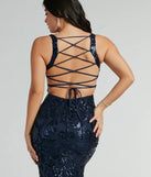 Step into Prom 2025 in a navy blue prom dress, where unique Windsor accents and the standout Moira Lace-Up Bodycon Sequin Formal Dress style come together.