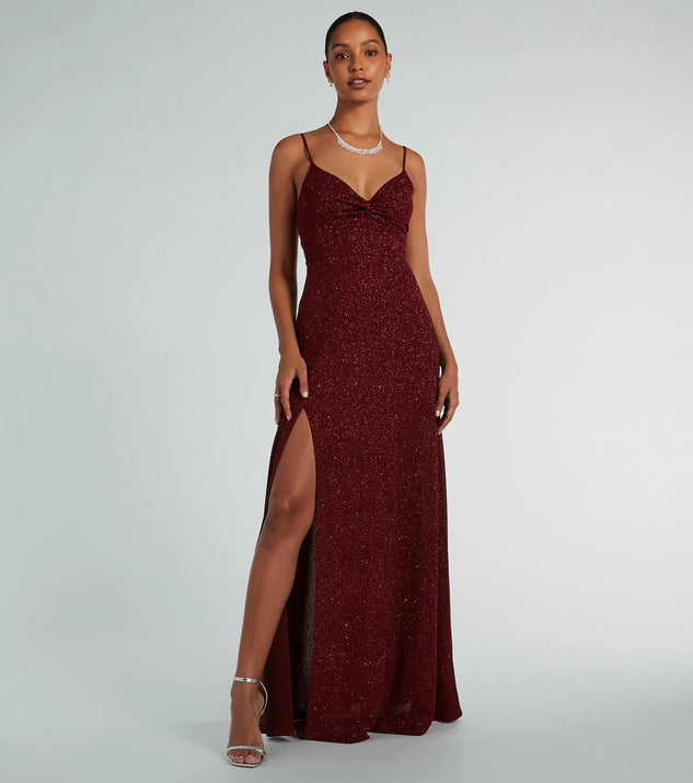 Turn heads at Prom 2025 in this wine prom dress, where statement-making details meet the iconic style of the Elizabeth Cutout A-Line Slit Glitter Formal Dress .