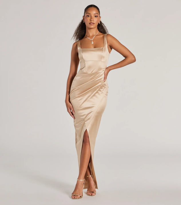 Turn heads at Prom 2025 in this gold prom dress, where statement-making details meet the iconic style of the Rebecca Satin Slim-Fit Formal Dress .