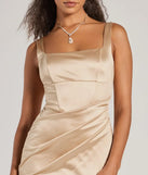 Make a bold statement in the Rebecca Satin Slim-Fit Formal Dress in gold, the perfect spring dress for weddings, cocktail hours, nights out, and/or seasonal celebrations.